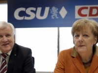 Ak Merkelová vyhrá voľby, strop pre počty utečencov nebude